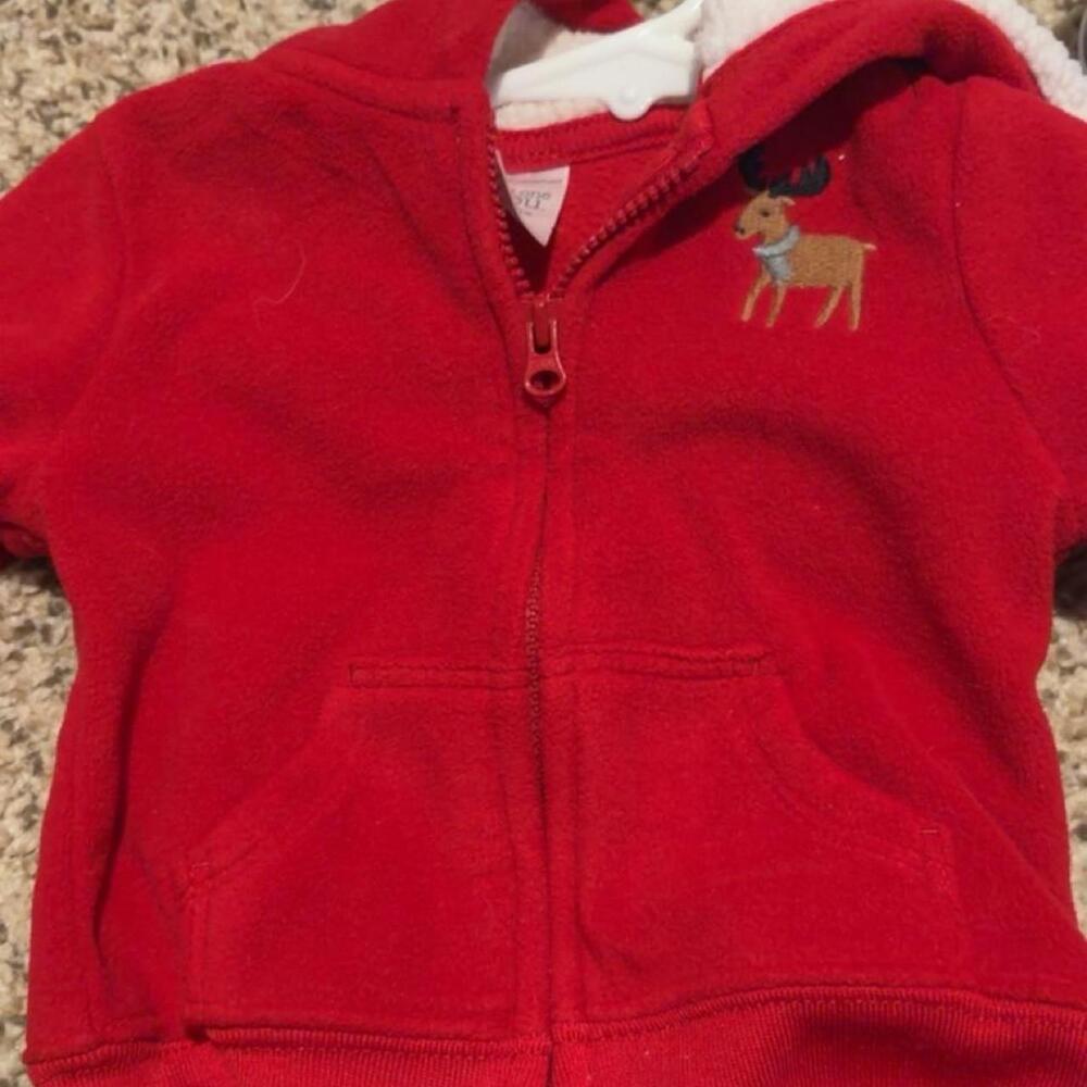 Red zip up hoodie with reindeer design, size 3M